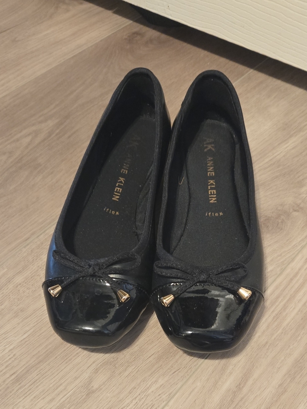 Anne Klein Black Patent Toe Ballet Flats with Bow and Gold Accents
